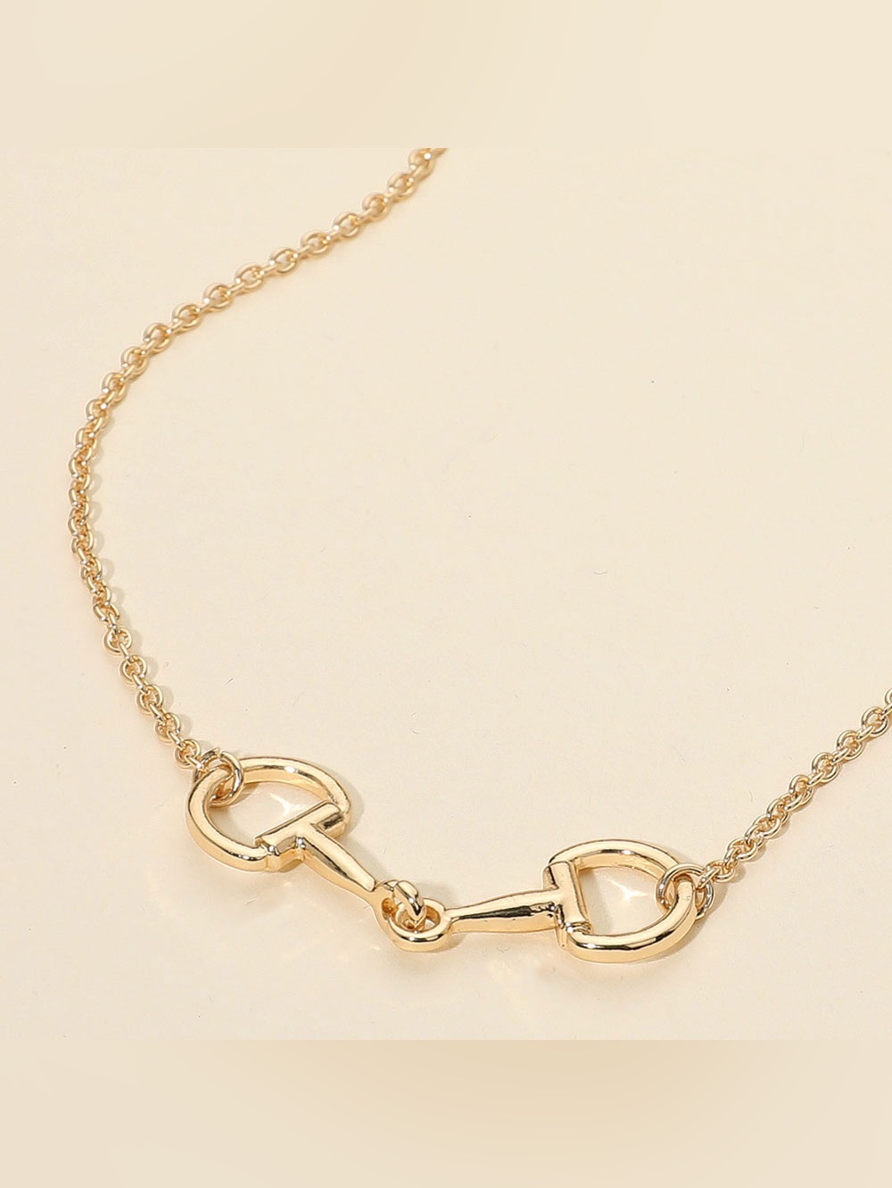 Gold Metal Horsebit Pendant Necklace
